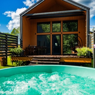 Фотография Коттеджа Частный Дом Барнхаус №1 с дровяной баней и горячей купелью, на 7 госте