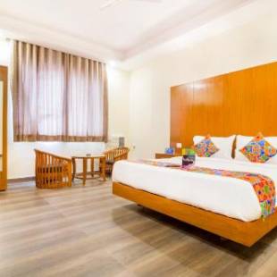 Фотографии гостиницы 
            FabHotel Aries Delhi Airport