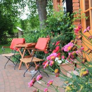 Фотографии гостевого дома 
            Urlaub für die Familie mit viel Platz im Garten