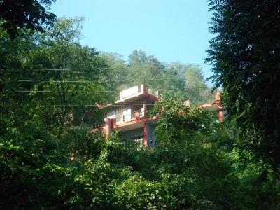 Фотография гостиницы Hill Top Swiss Cottage