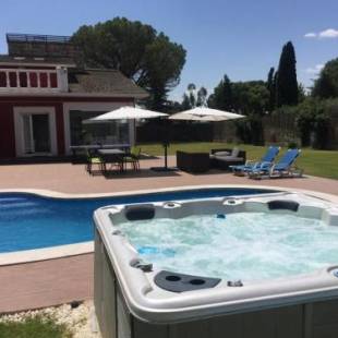 Фотографии гостевого дома 
            Casa de sol, piscina y jacuzzi en Comunidad de Madrid
