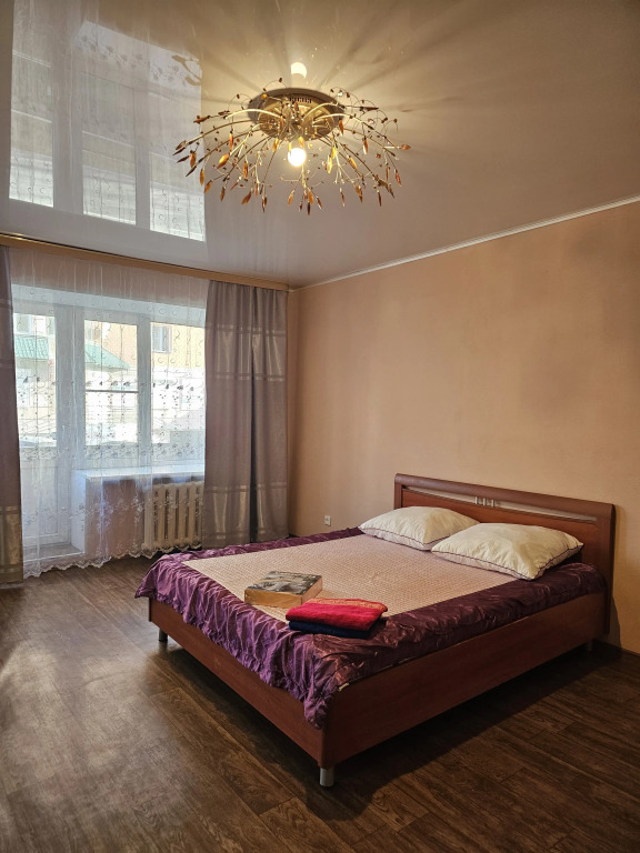 Фотография квартиры Квартира Уютная студия с балконом в центре города