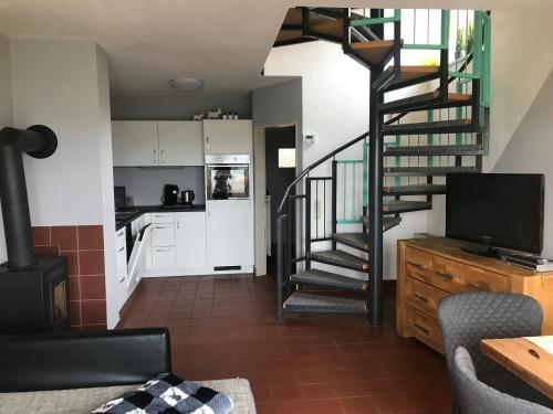 Фотография гостевого дома Ferienhäuser Schlossberg