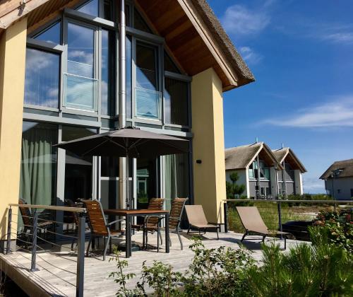 Фотография гостевого дома Ostsee - Reetdachhaus Nr 44 "Reethüs - Marina" im Strand Resort