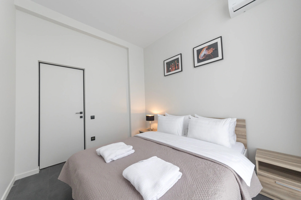 Фотография квартиры Апартаменты Red Apartments Арт Лайт Моретти