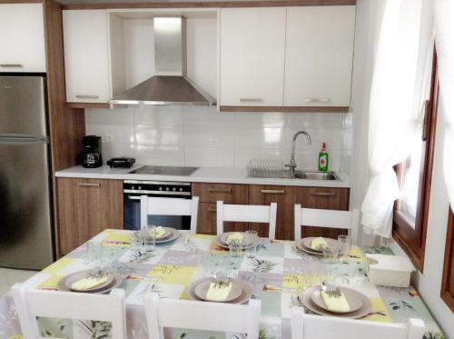 Фотография гостевого дома Arokaria Holiday Houses