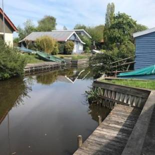 Фотографии гостевого дома 
            Ferienhaus Heinkens Hoek mit eigenem Bootssteg