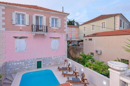 Фотография гостевого дома Seaside apartments with a swimming pool Jelsa, Hvar - 2067