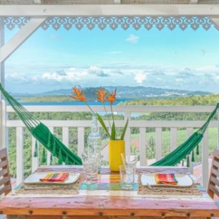 Фотография гостевого дома Bungalow Vanille Pacane Vue Mer avec Spa Privé