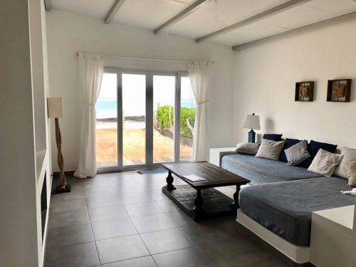 Фотография гостевого дома Sandy Feet House