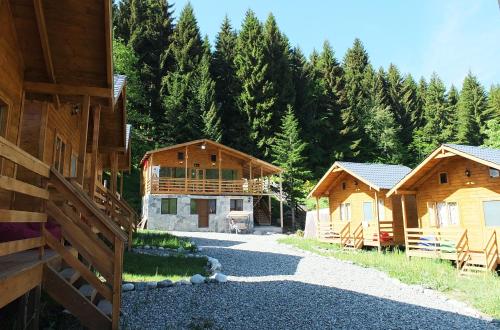 Фотографии мини отеля 
            Mountain Cabins