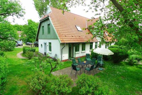 Фотография гостевого дома Ferienhaussiedlung Strandperlen Sanddornhof 3a (Typ VIII)