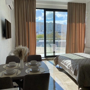 Фотография квартиры Апартаменты Абсолютно новый апартамент в 50 метрах от моря