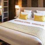 Фотография гостиницы Contact Hôtel Le Provençal Bordeaux Lac avec Bornes électriques