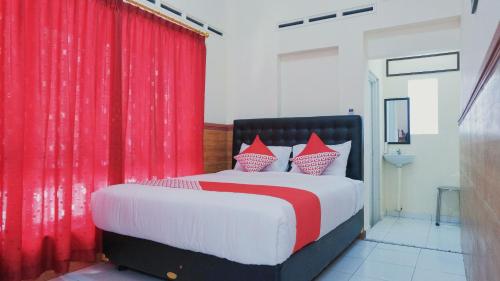 Фотография гостиницы OYO 1190 Griya Soeratin Residence Syariah