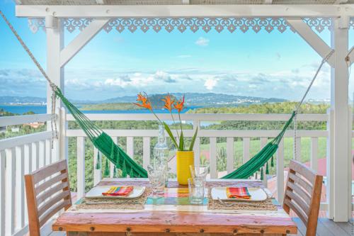 Фотография гостевого дома Bungalow Vanille Pacane Vue Mer avec Spa Privé