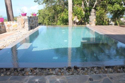 Фотографии гостевого дома 
            Bungalow d'une chambre avec vue sur la mer piscine partagee et jardin clos a Sainte Rose