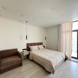 Фотография квартиры Апартаменты Дизайнерская студия  LS - Lux- Beautiful Days с видом на горы и море с 15 этажа