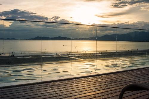 Фотография мини отеля Pousada Conca di Mare - Restaurante - Pé na areia com serviço de praia