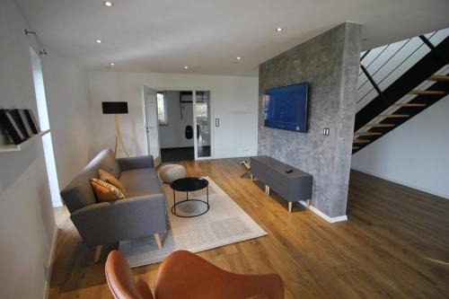 Фотографии гостевого дома
Modernes Ferienhaus im Schwarzwald