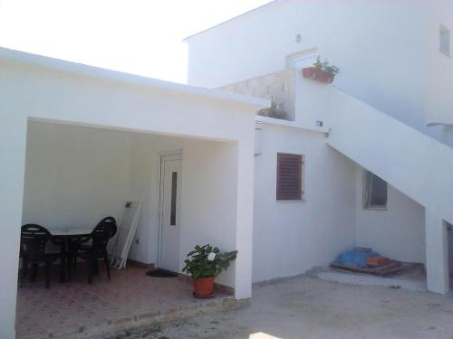 Фотография гостевого дома Apartments with a parking space Nin, Zadar - 13158