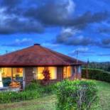 Фотография гостевого дома Whispering Pines Cottages