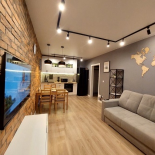Фотография квартиры Апартаменты Дизайнерский лофт