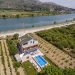 Фотография гостевого дома Holiday house with a swimming pool Opuzen, Neretva Delta - Usce Neretve - 8818