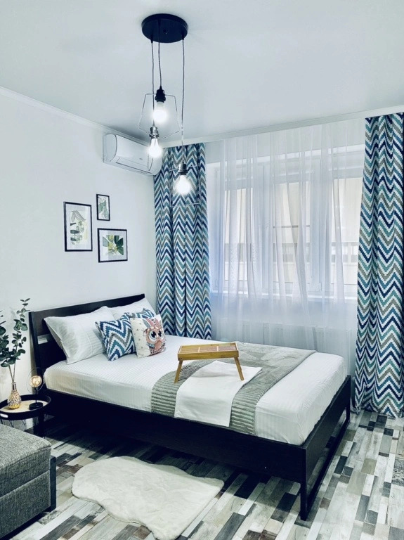 Фотография квартиры Стильная однокомнатная «Зигзаг» возле парка и озера