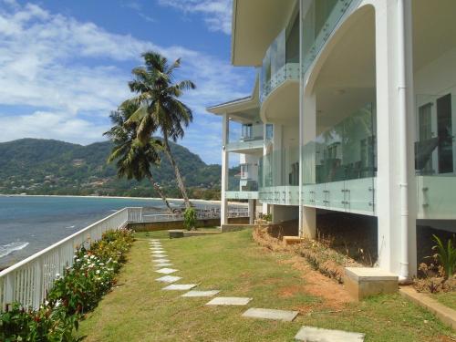 Фотография апарт отеля VallonEnd Beachfront villa with excellent view