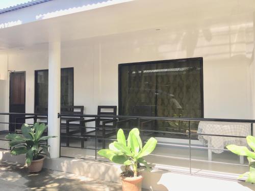 Фотография гостевого дома Paguia’s Cottages