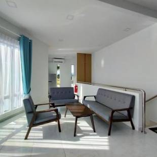 Фотографии гостиницы 
            OYO 89859 Pp Traveller's Hotel