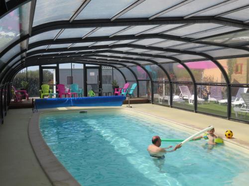 Фотография кемпинга Camping Les P'tites Maisons dans la Prairie