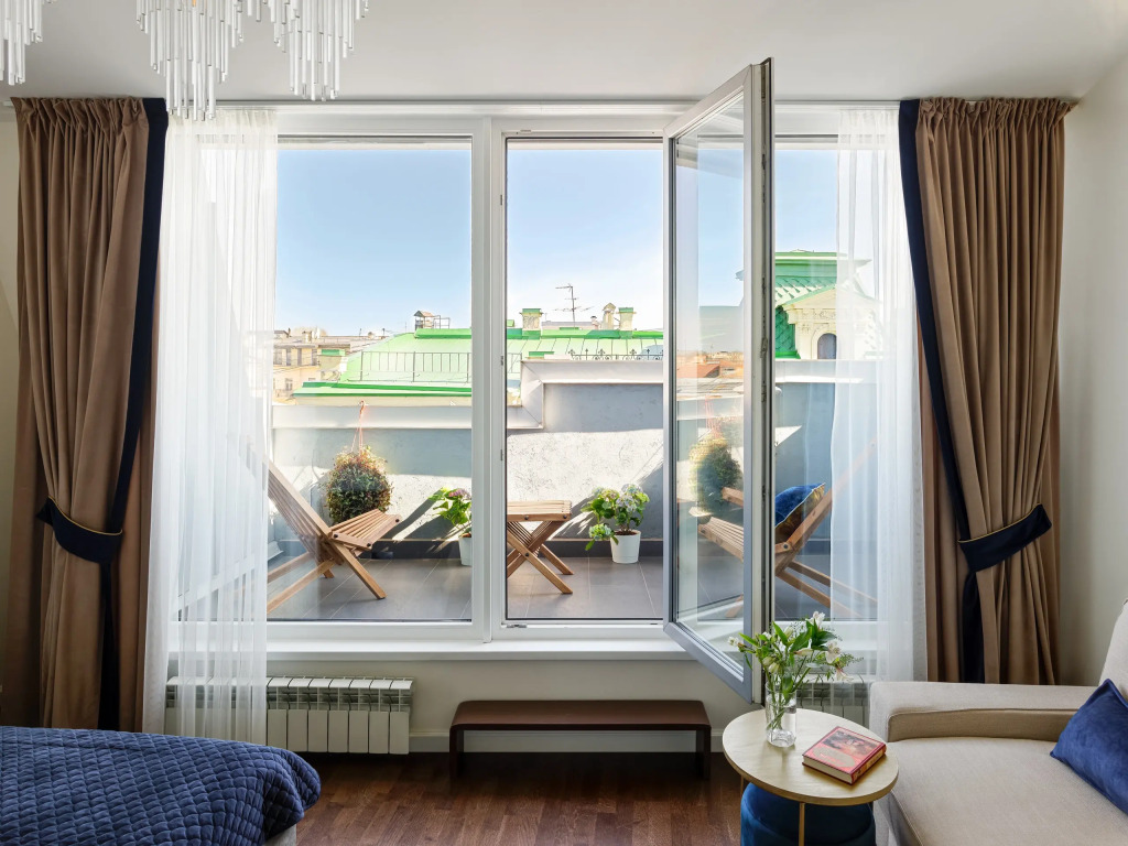 Фотография квартиры Апартаменты Minin Apartments Мансарда с двумя балконами на Невском 80 кв.м.
