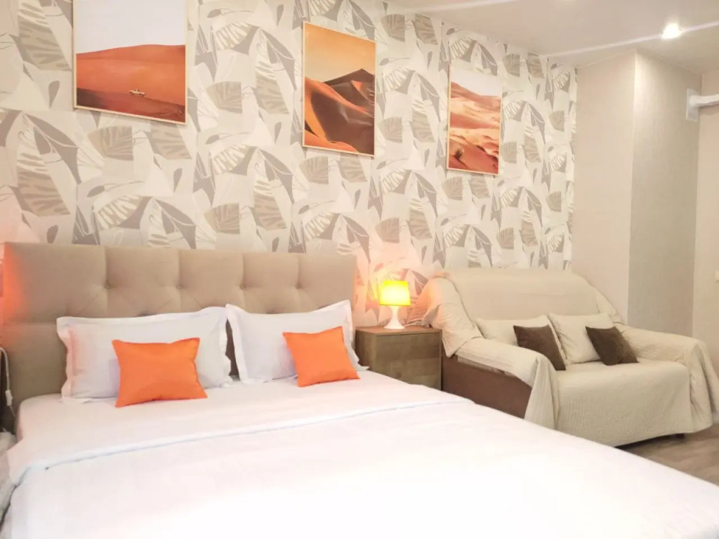 Фотография квартиры Квартира Студия Уютная в Оранжевом Тоне