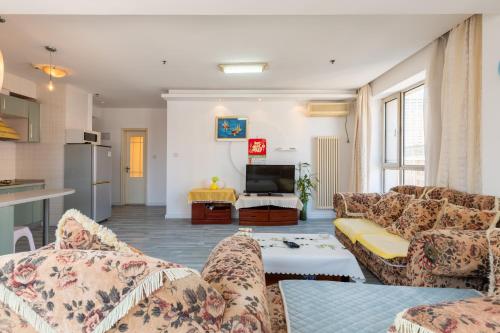 Фотография квартиры Dalian Xiuzhu Mansion Apartment