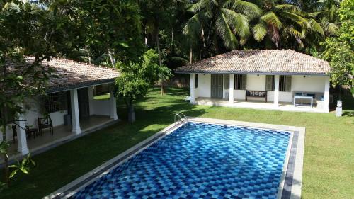 Фотография Коттеджа Thalpe Bungalows