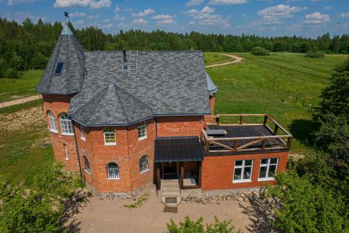 Фотография гостевого дома Замок в лесу