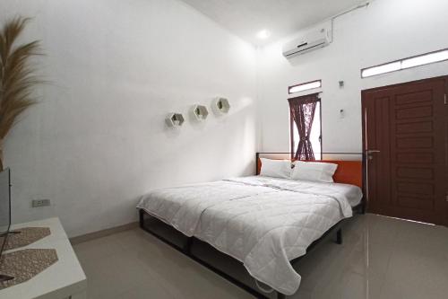 Фотография гостиницы Vaccinated Staff - OYO 90124 Oemah Ratu Hostel Syariah