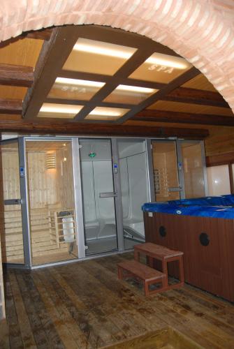 Фотография гостевого дома Casa rural de estilo rustico con SPA