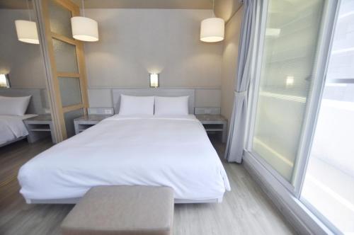 Фотография гостиницы Kindness Hotel - Hanshen