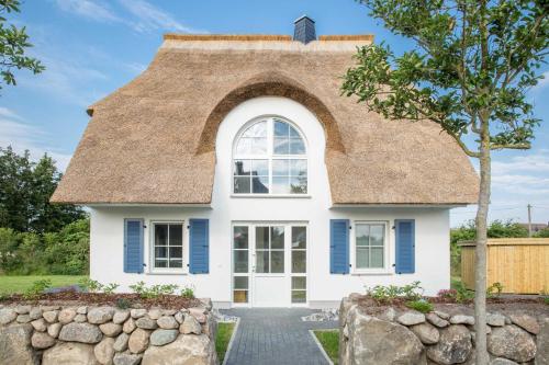 Фотография гостевого дома Ferienhaus Schilfrohrsaenger 51