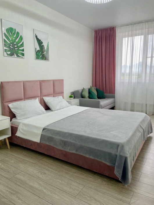 Фотографии квартиры 
            Квартира Уютные апартаменты с видом на горы