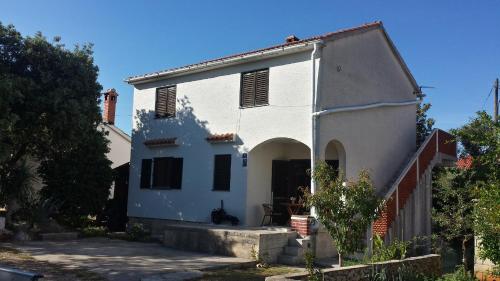 Фотография гостевого дома Apartments with a parking space Ugljan - 15613