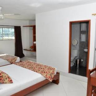 Фотографии гостиницы 
            Hotel Canoa Inn