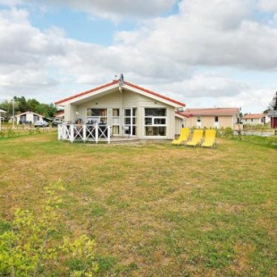 Фотография гостевого дома Three-Bedroom Holiday home in Grömitz 20