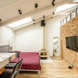 Фотография квартиры Apartments Лофт с Белым Камином