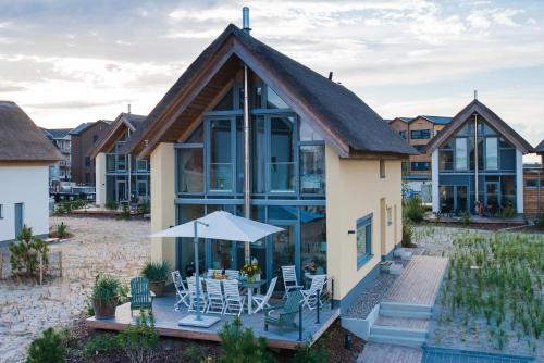 Фотография гостевого дома Ostsee - Reetdachhaus Nr 42 "Waterkant" im Strand Resort