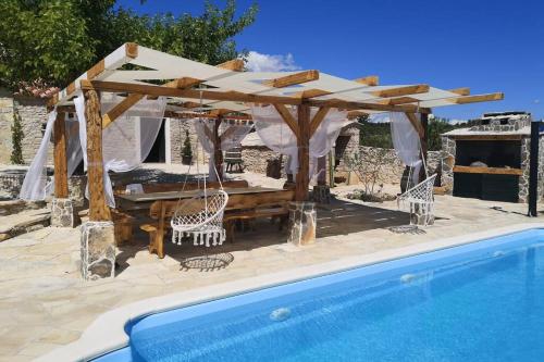 Фотографии гостевого дома 
            Juniper Stone Cottage