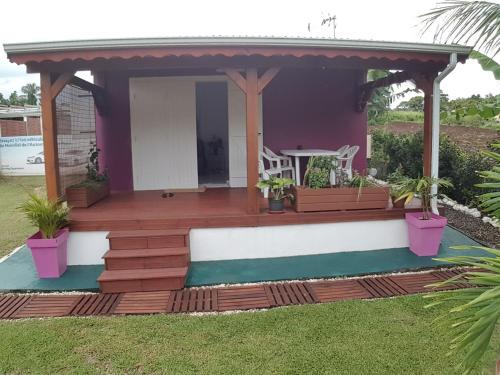 Фотография гостевого дома Les cottages de roseau